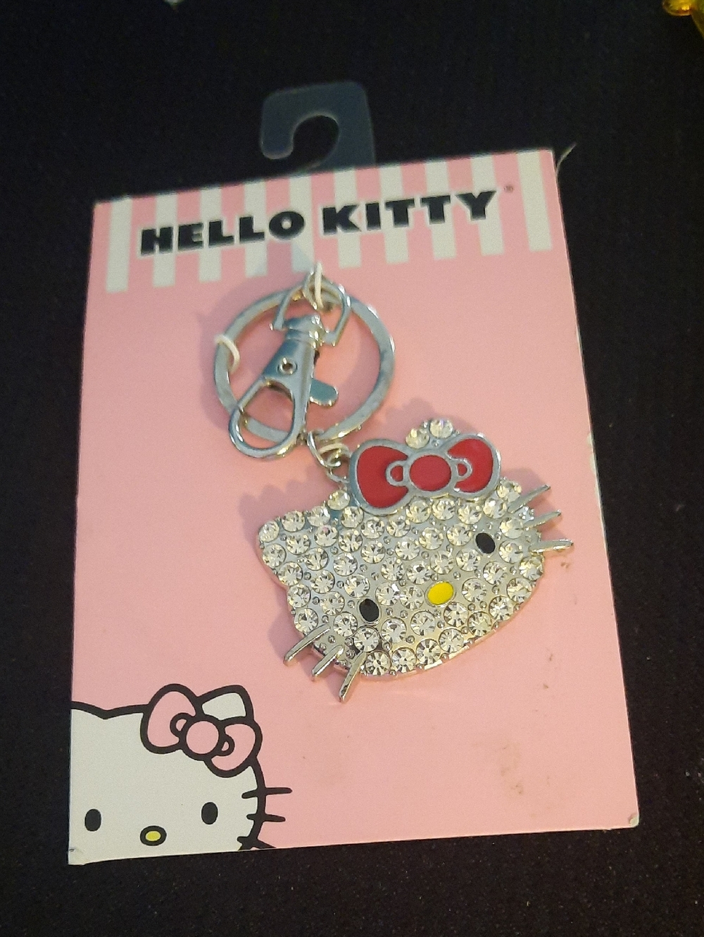 Hello Kitty Silver Crystal Face Keychain with Red Bow